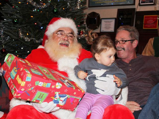 Children's Christmas Party at 8-100. 12-9-2012. Santa pays a visit . Photo by Vincent P. Tuzzolino